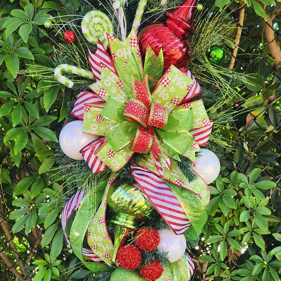 Red, White and Green Christmas Swag with a Lollipop and Green Candy Canes.